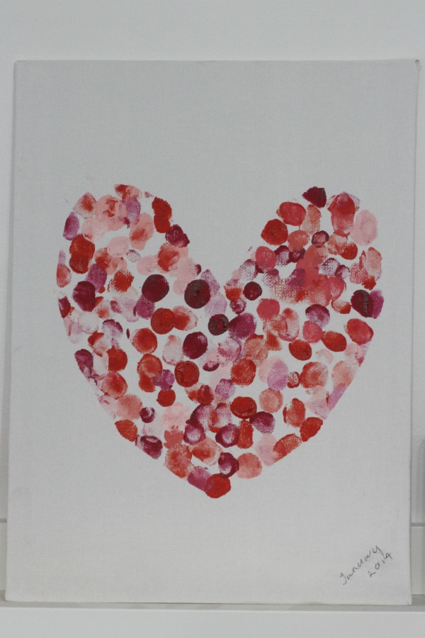 This family fingerprint heart art canvas is so simple to make and is perfect for making together as a family. It makes a wonferful Valentines decoration.