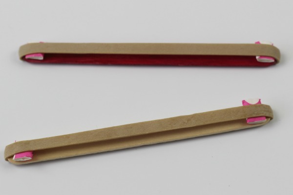 Elastic bands on popsicle sticks 2