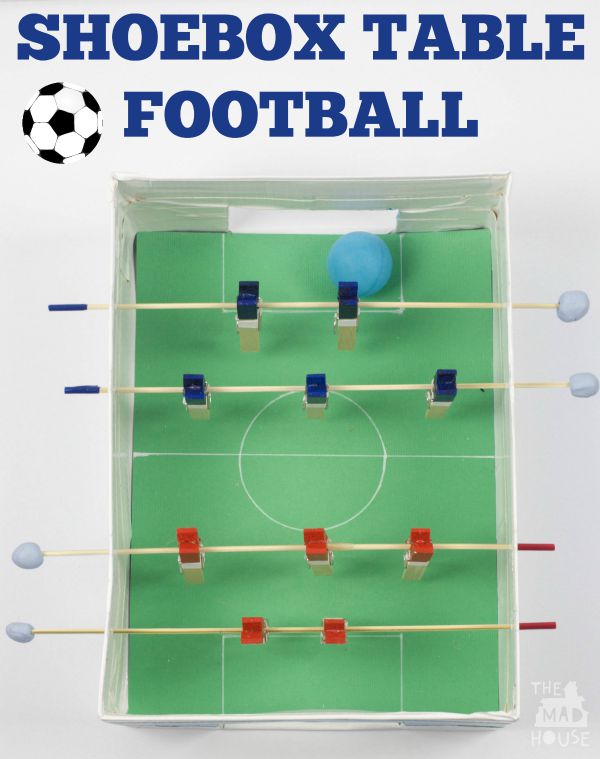 Shoebox table football/foosball game. This fab DIY football or foosball table is perfect for making with the kids and having loads of fun with. This is a super fun DIY craft that uses recyclables and perfect for kids.