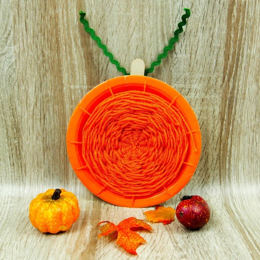 Pumpkin paper plate weaving