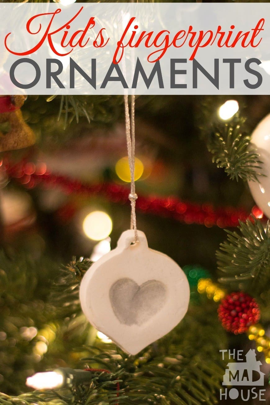 White clay Christmas fingerprint ornament. Make an adorable Christmas keepsake decoration with this simple how to and the clay is dry in under 10 minutes! 