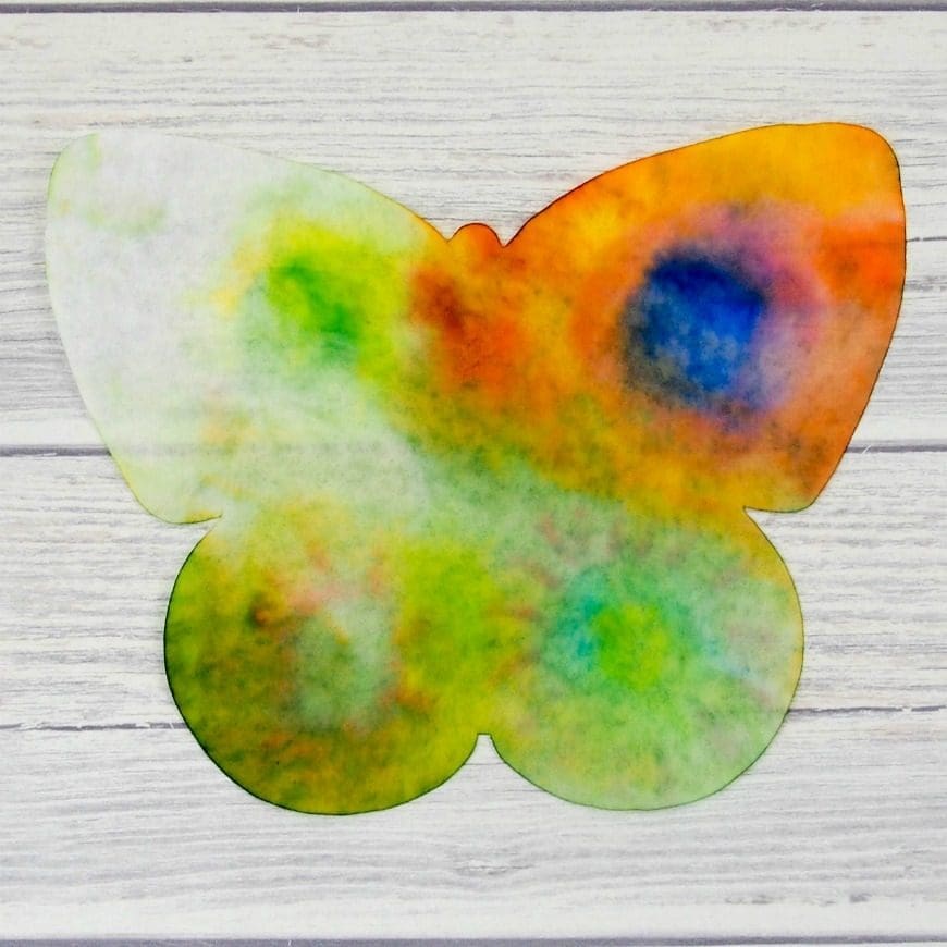 This butterfly rain art is a super process art activity for kids and a great way to investigate the science of colour