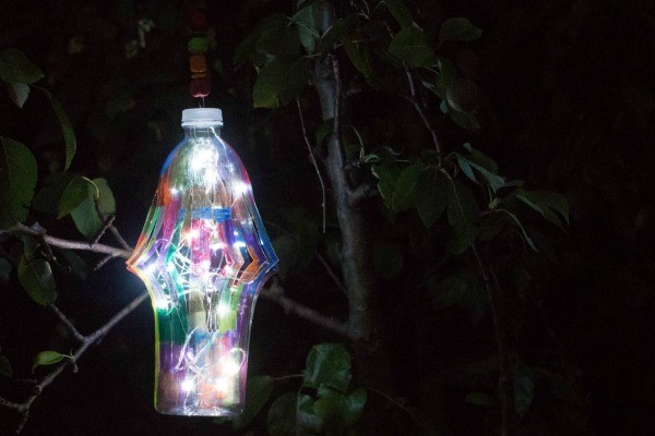 DIY Garden lantern - This is a fantastic DIY craft for upcycling plastic bottles. A beautiful plastic bottle DIY garden lantern.