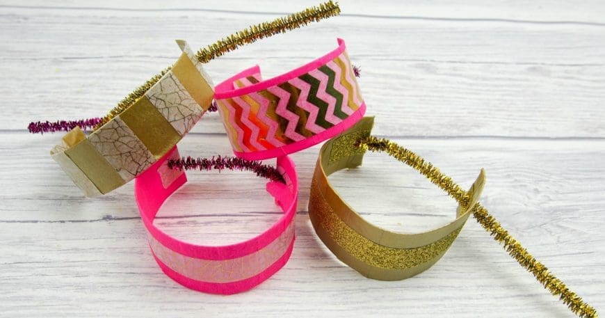 Simple Washi Tape Decorated Toilet Roll Bracelets or Cuffs are a great kids craft perfect for up cycling cardboard tubes and so easy to make. These are just about the cutest, simplest TP roll craft for kids. 