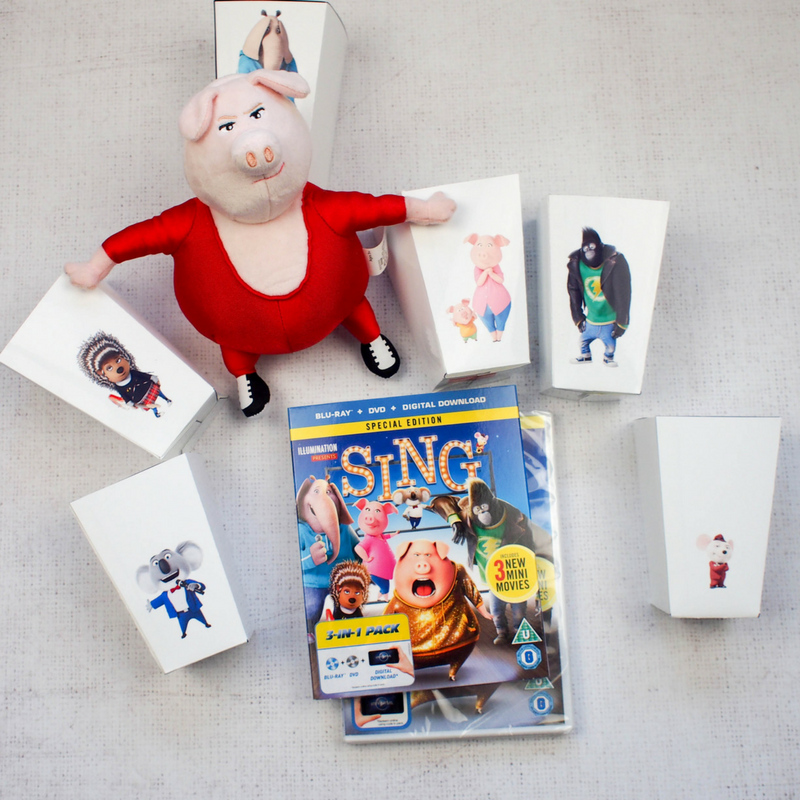 Have a SING Family Movie Night with our Free Printable SING Popcorn Boxes