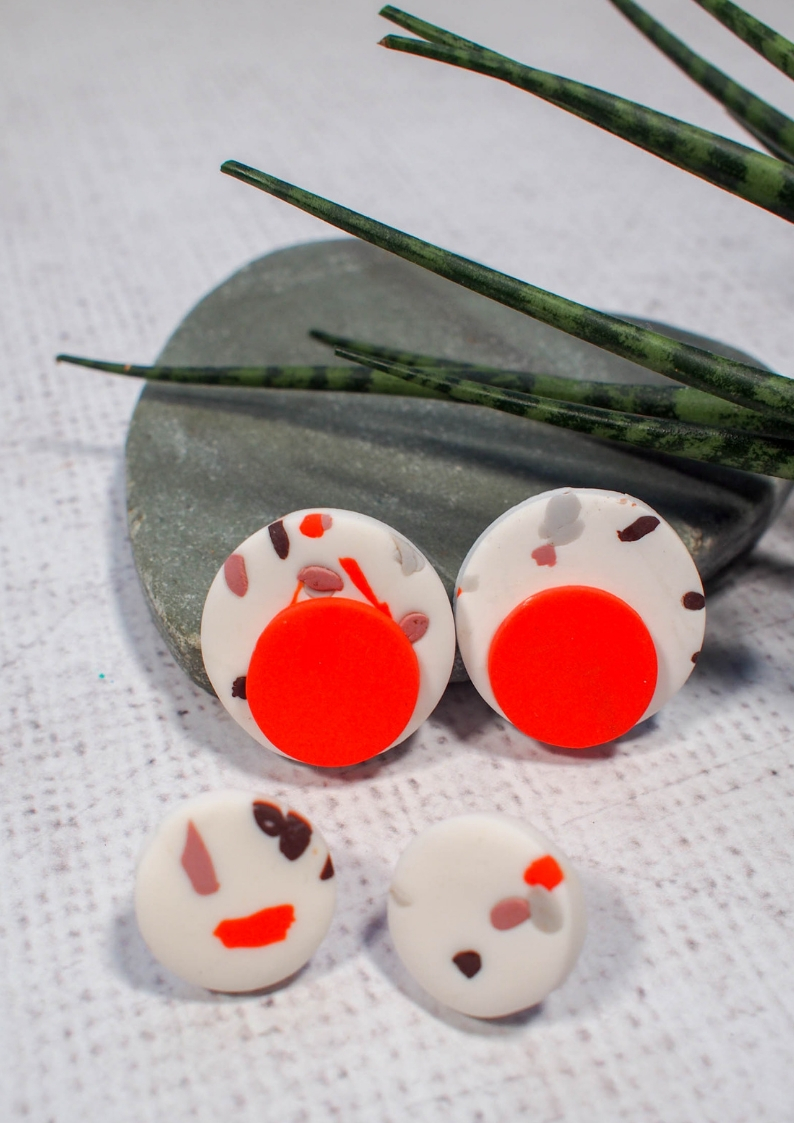 Make your own faux polymer clay faux terrazzo earrings. This DIY is a foolproof way to add a bit of pattern and color to any outfit while using up that scrap clay pile
