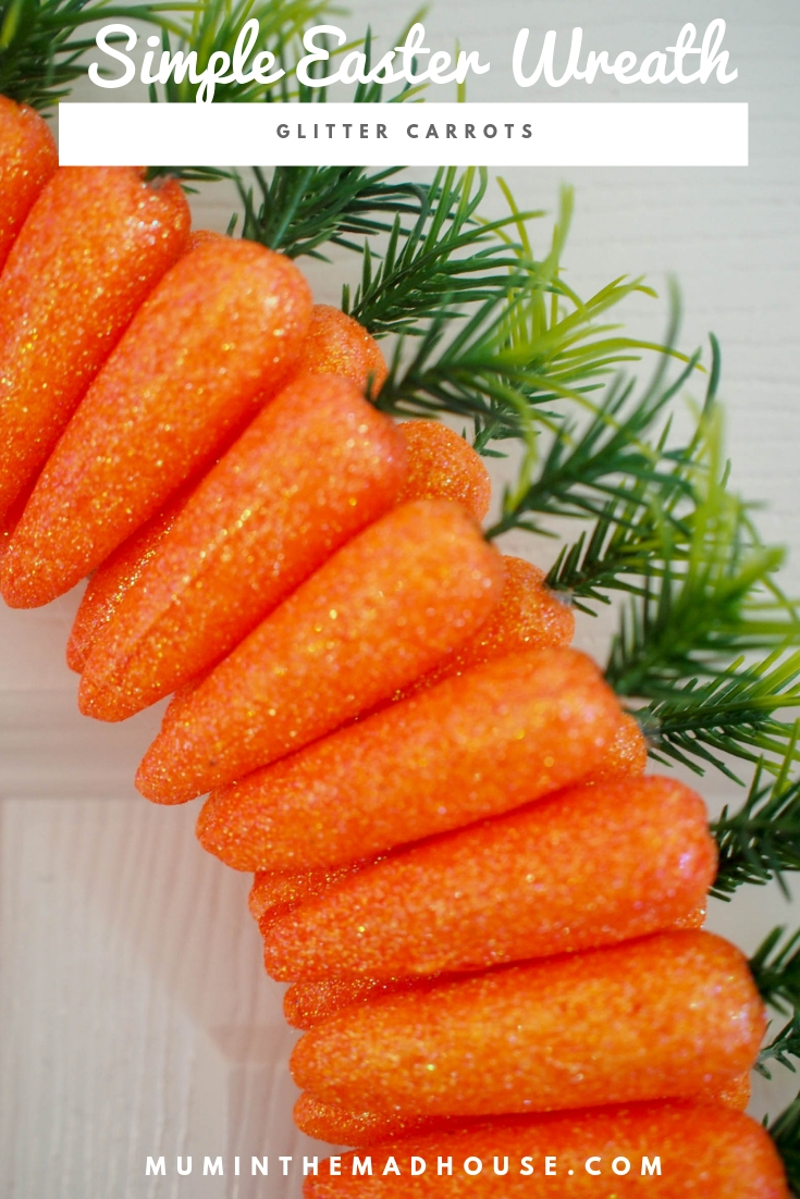 Simple DIY Easter Carrot Wreath.  This inexpensive seasonal wreath is easy to make and inexpensive too. 