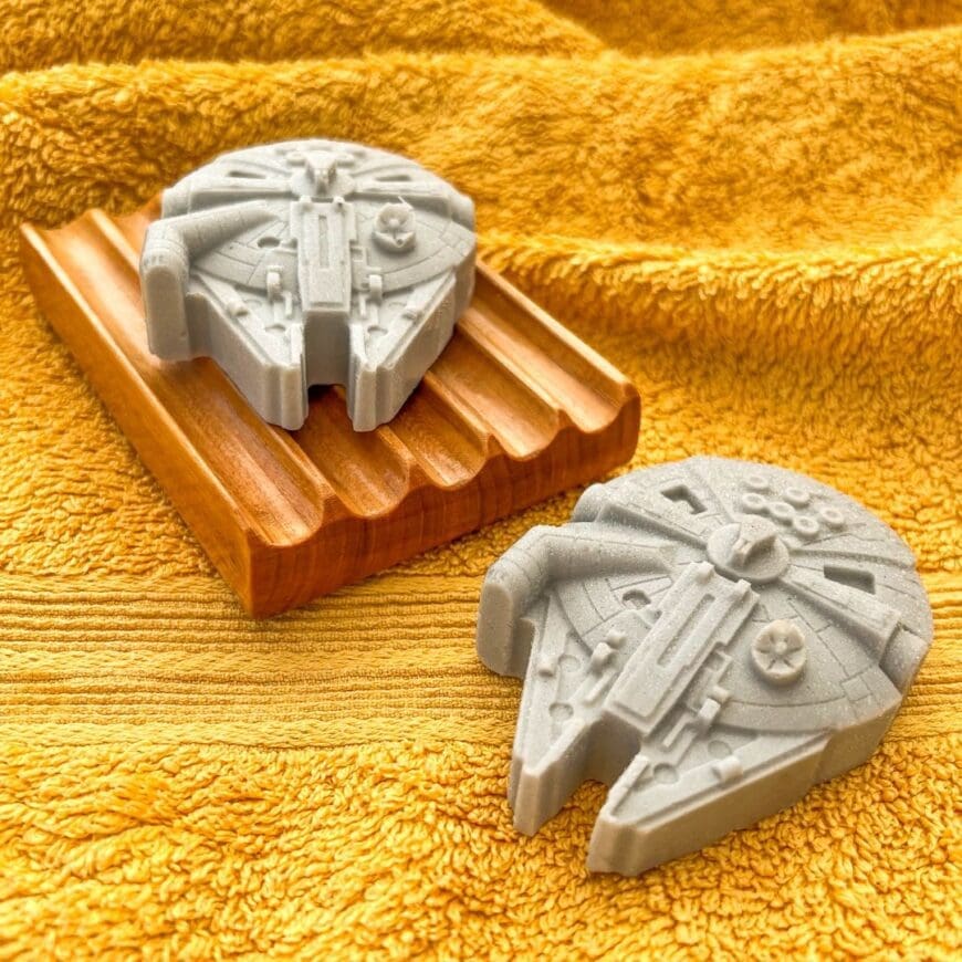 Learn how to make your own DIY Star Wars-inspired soaps with this tutorial for DIY Star Wars melt and pour soaps that create fun shaped soaps including Darth Vader, Millenium Falcon, R2D2, Xwing fighters, Hans Solo.