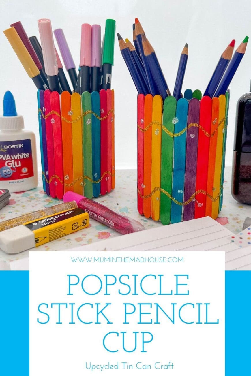 Two rainbow Popsicle Stick Pencil Cups one with pens in and one with pencils in